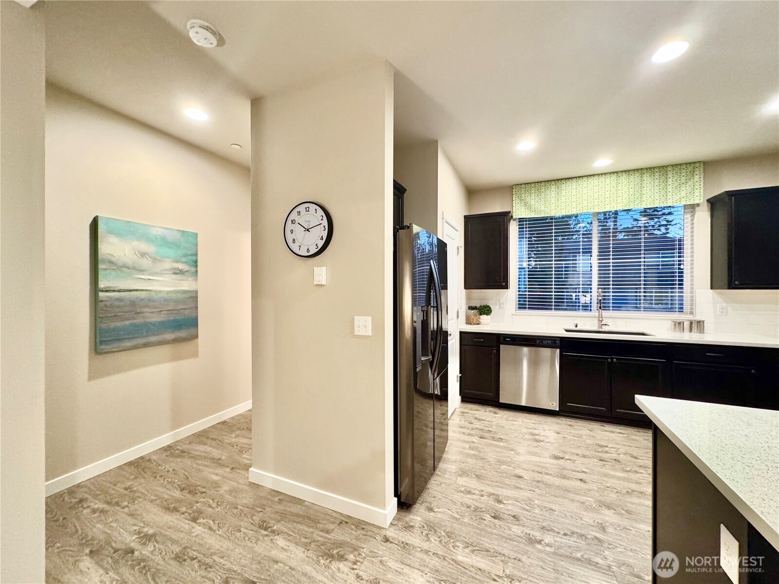 1928 78th Place Southeast Everett, WA 98203 - Photo 18 of 39 a view of kitchen with stainless steel appliances granite countertop a refrigerator and a sink