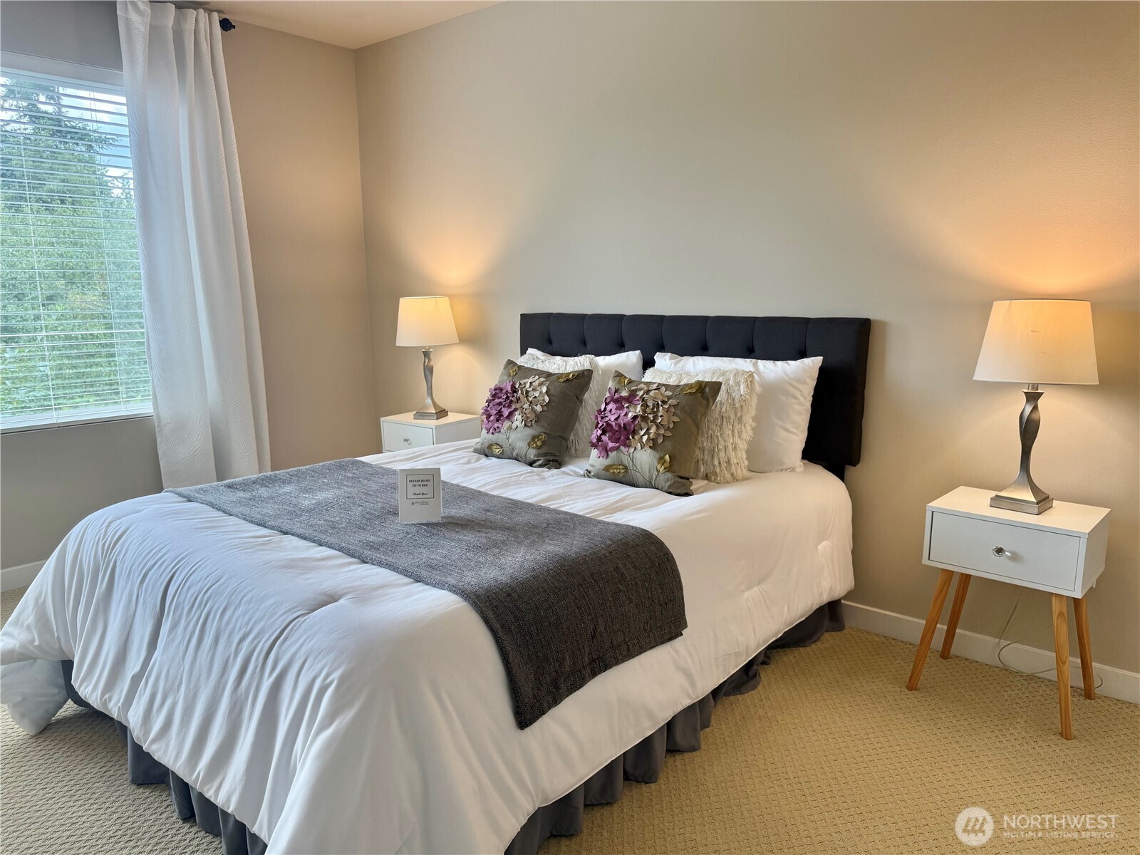 1928 78th Place Southeast Everett, WA 98203 - Photo 20 of 39 a bedroom with a bed and a lamp