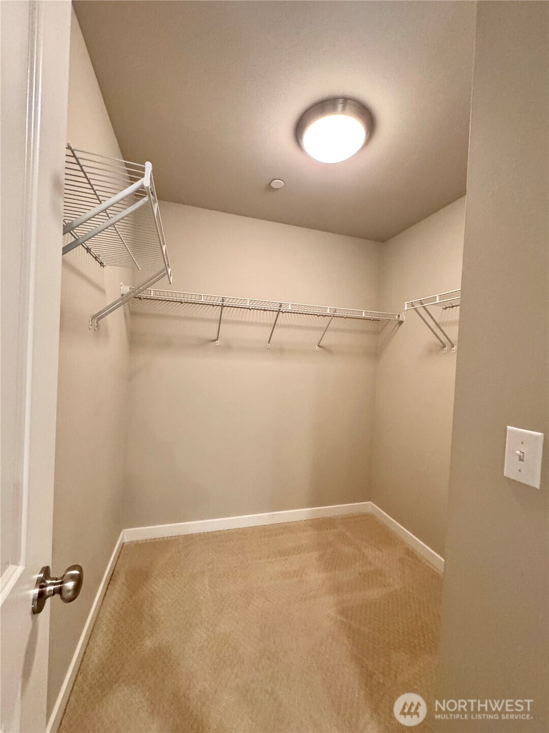 1928 78th Place Southeast Everett, WA 98203 - Photo 31 of 39 a view of a room with racks on the wall