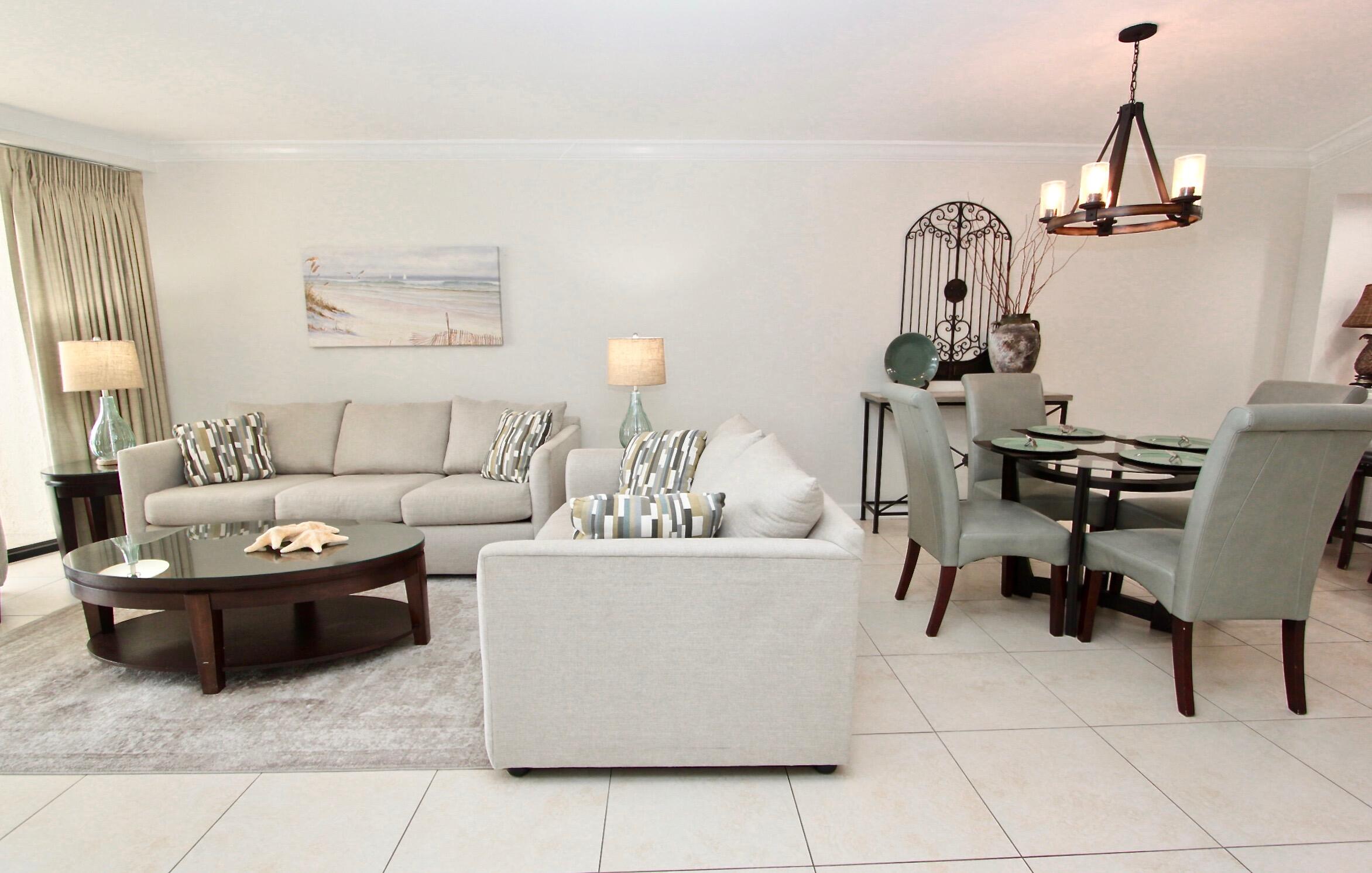 4239 Beachside 2, Unit 239 Miramar Beach, FL 32550 - Photo 6 of 18 a living room with furniture and a window