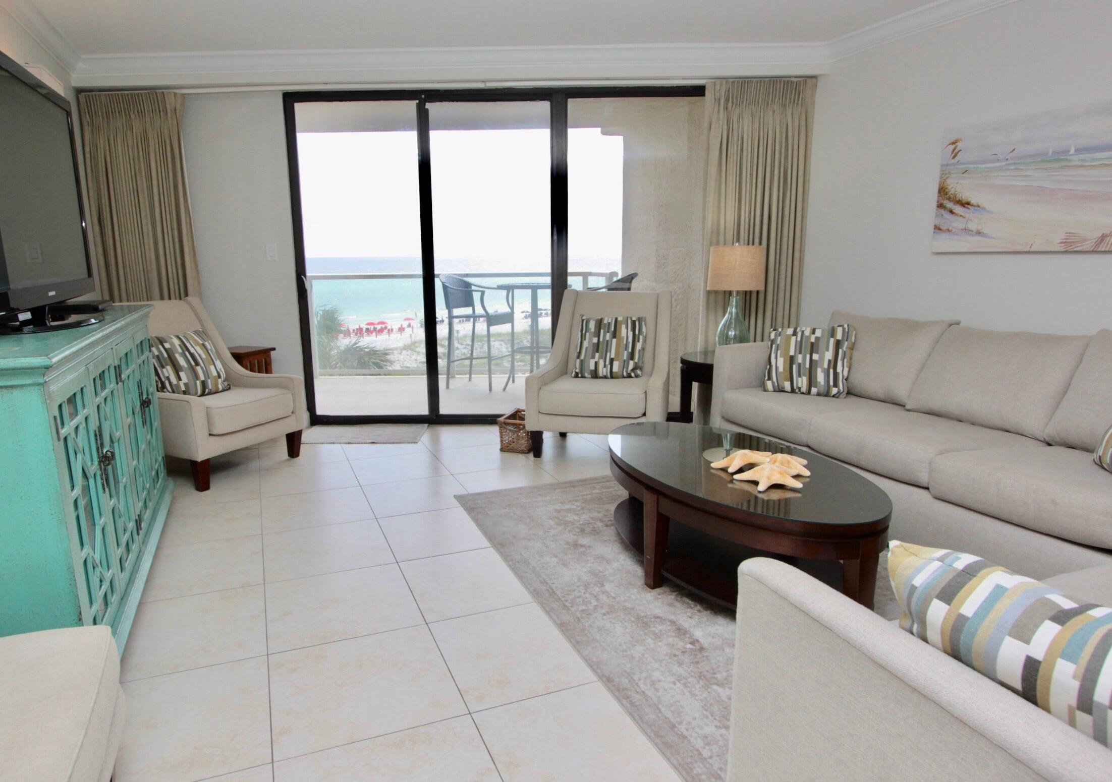 4239 Beachside 2, Unit 239 Miramar Beach, FL 32550 - Photo 7 of 18 a living room with furniture and a large window