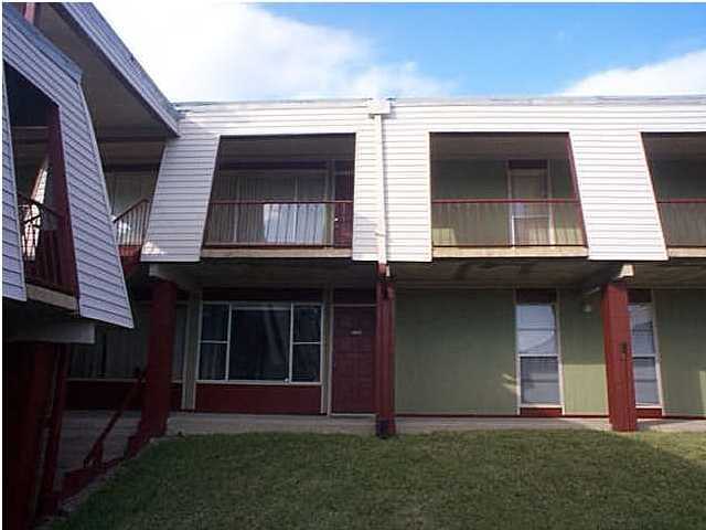 210 Pelham Road, Unit C120 Fort Walton Beach, FL 32547 - Photo 1 of 11 a brick house with a large windows