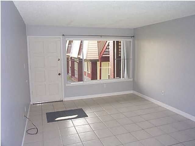 210 Pelham Road, Unit C120 Fort Walton Beach, FL 32547 - Photo 2 of 11 a view of an empty room and window