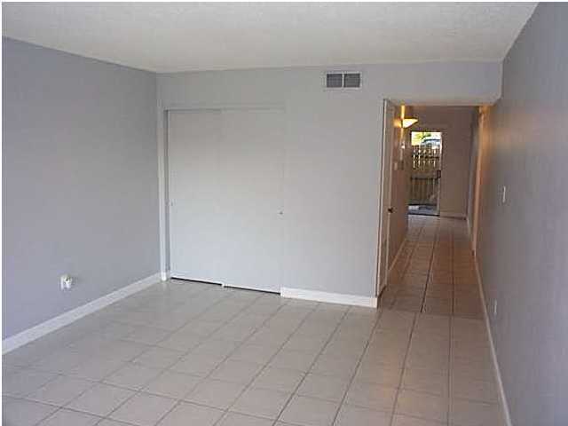210 Pelham Road, Unit C120 Fort Walton Beach, FL 32547 - Photo 3 of 11 a view of empty room with window