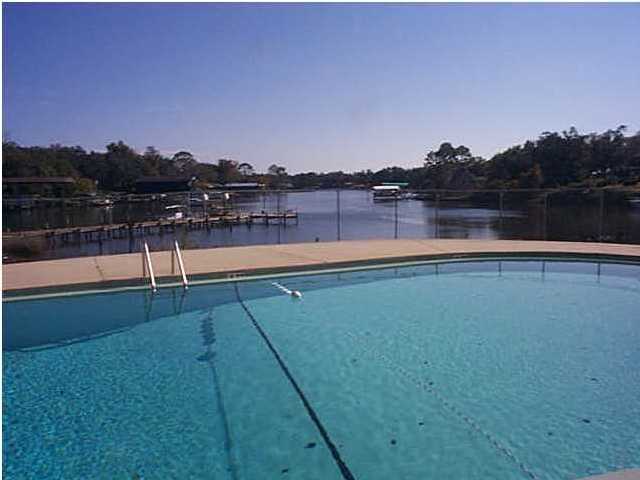 210 Pelham Road, Unit C120 Fort Walton Beach, FL 32547 - Photo 10 of 11 a view of lake with city view
