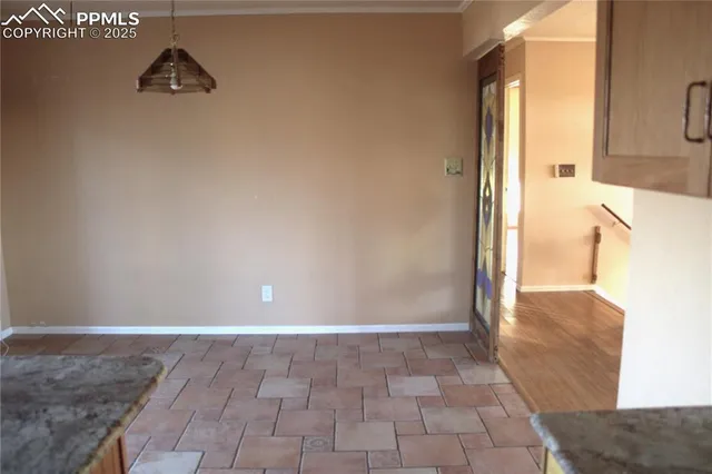 a view of a sink and an entryway