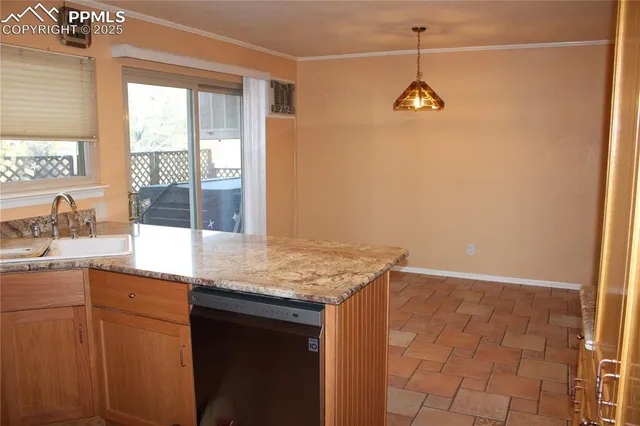 an empty room with wooden floor and closet