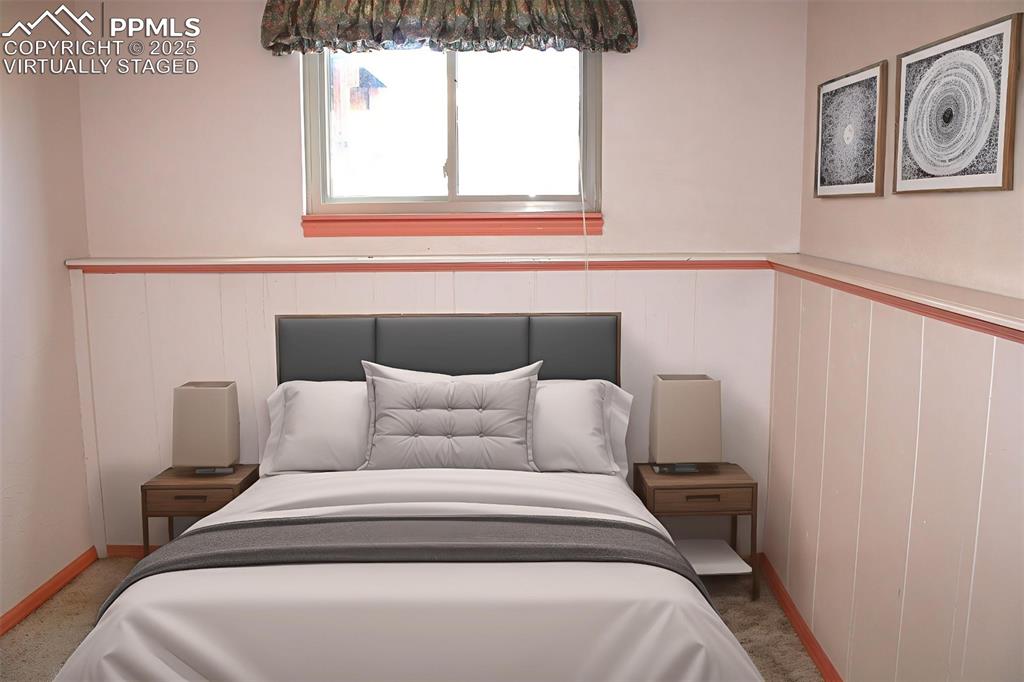 8340 Piute Road Colorado Springs, CO 80926 - Photo 30 of 48 a bedroom with a bed and window