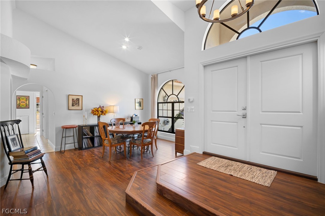 11772 Mahogany Run Fort Myers, FL 33913 - Photo 5 of 50 a view of a a dining room with furniture window and wooden floor
