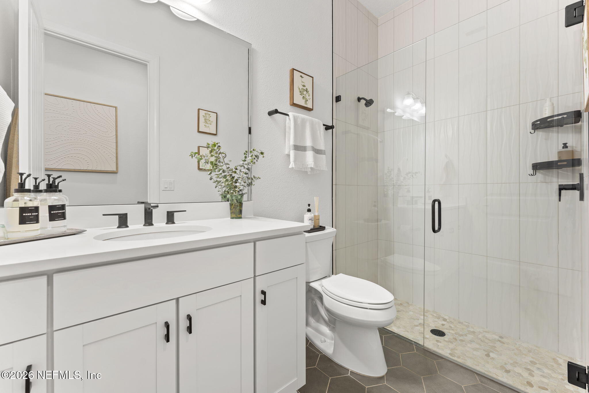 101 Elm Br Road St. Johns, FL 32259 - Photo 39 of 77 a bathroom with a toilet sink a shower and
