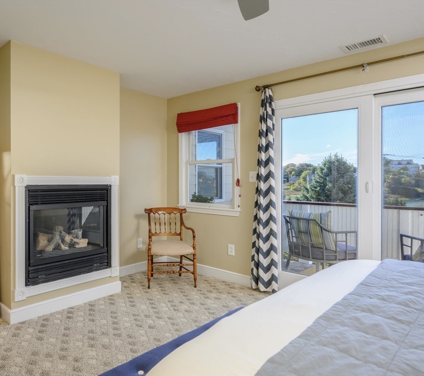 76 Wyola Road Hull, MA 02045 - Photo 14 of 28 a living room with furniture and a window