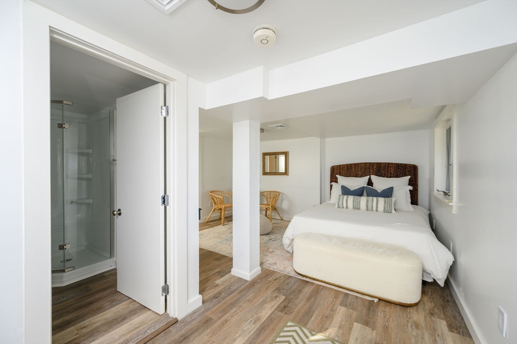 76 Wyola Road Hull, MA 02045 - Photo 18 of 28 a bedroom with a bed and a closet