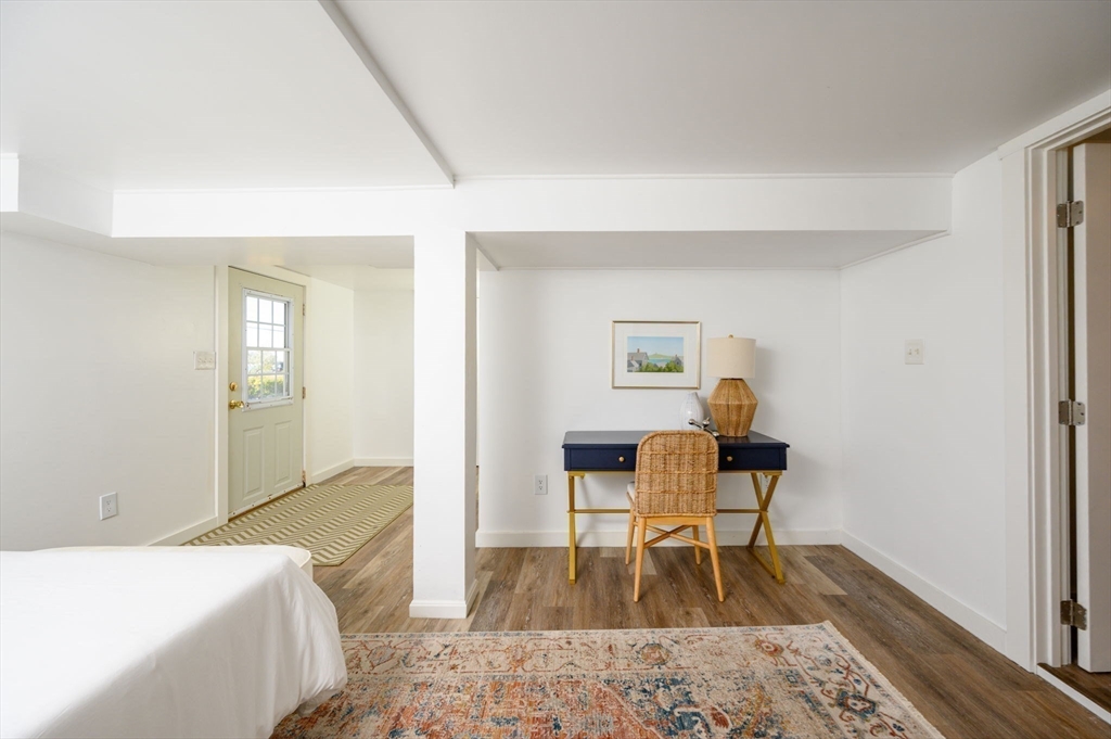 76 Wyola Road Hull, MA 02045 - Photo 19 of 28 a living room with furniture and a wooden floor
