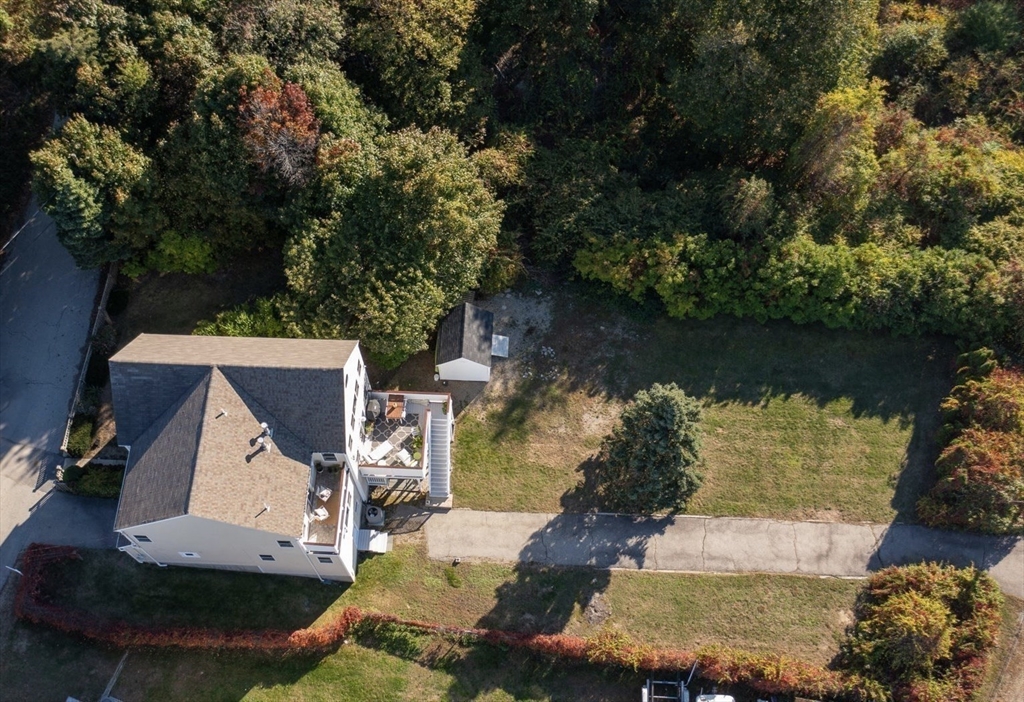 76 Wyola Road Hull, MA 02045 - Photo 21 of 28 an aerial view of a house with a yard basket ball court and outdoor seating
