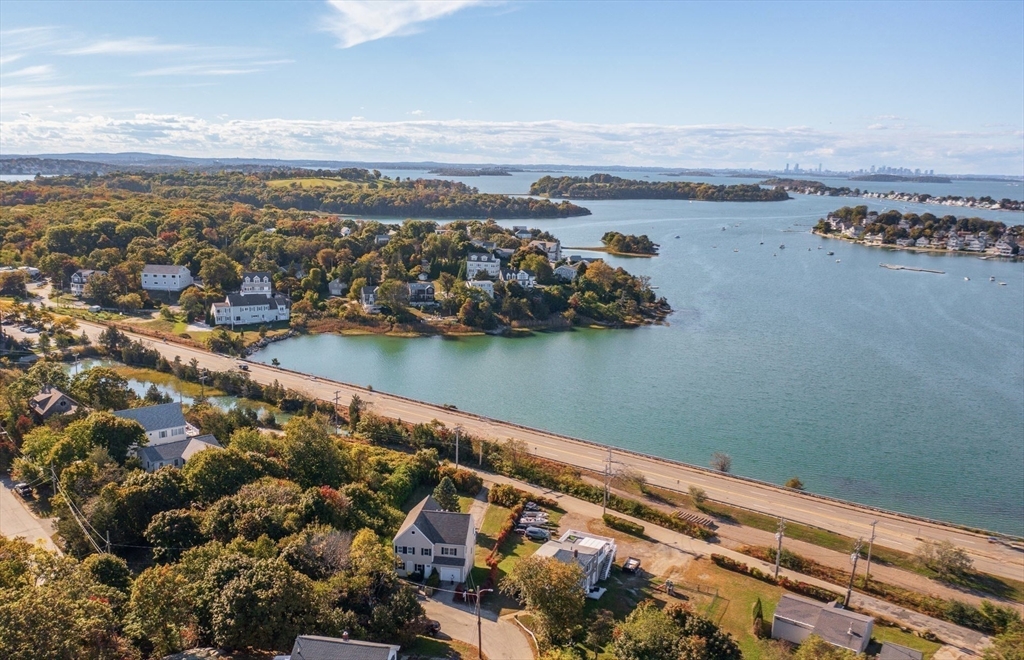 76 Wyola Road Hull, MA 02045 - Photo 23 of 28 an aerial view of ocean and residential houses with outdoor space