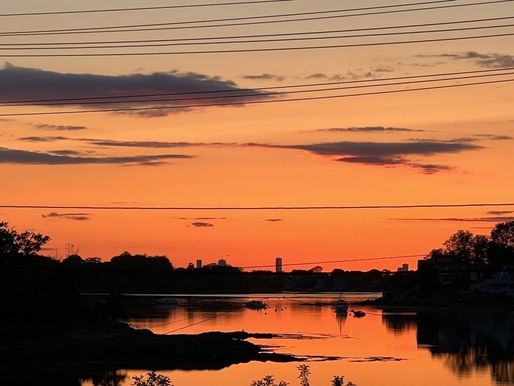 76 Wyola Road Hull, MA 02045 - Photo 24 of 28 a view of a terrace with a floor and a floor to ceiling window