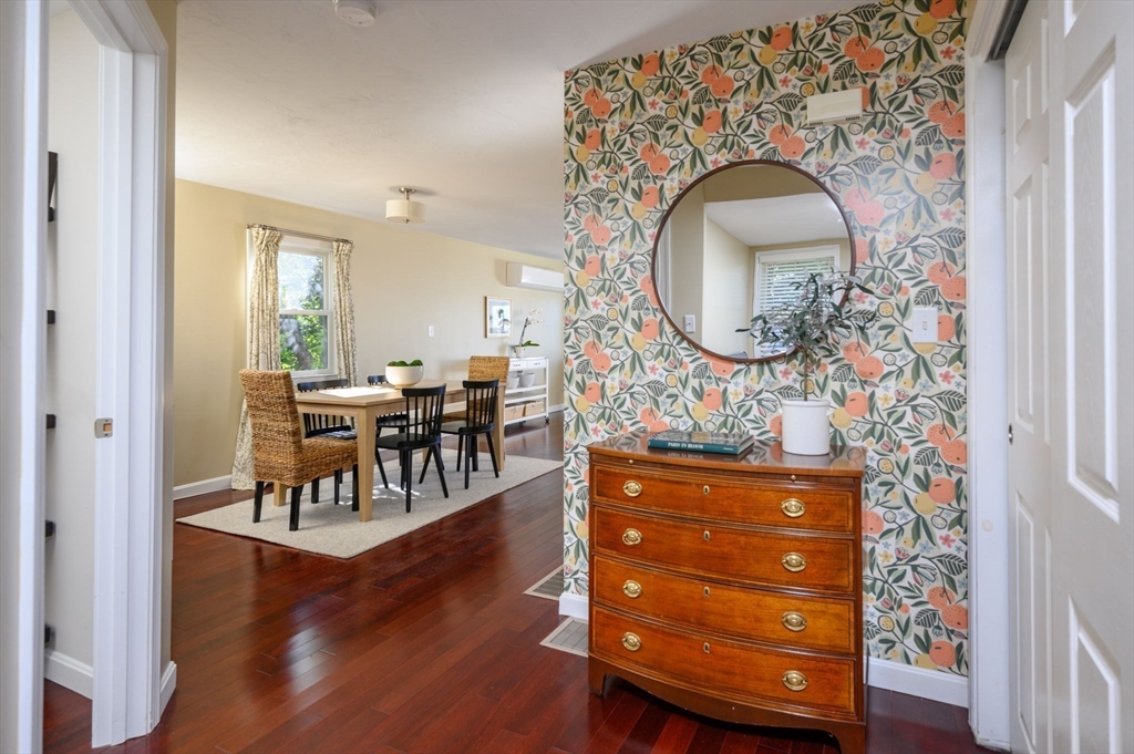 76 Wyola Road Hull, MA 02045 - Photo 4 of 28 a living room with furniture and a mirror