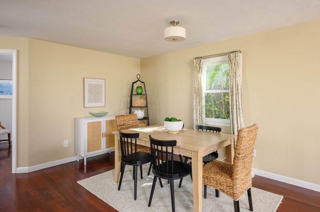 76 Wyola Road Hull, MA 02045 - Photo 7 of 28 a view of a dining room with furniture and wooden floor