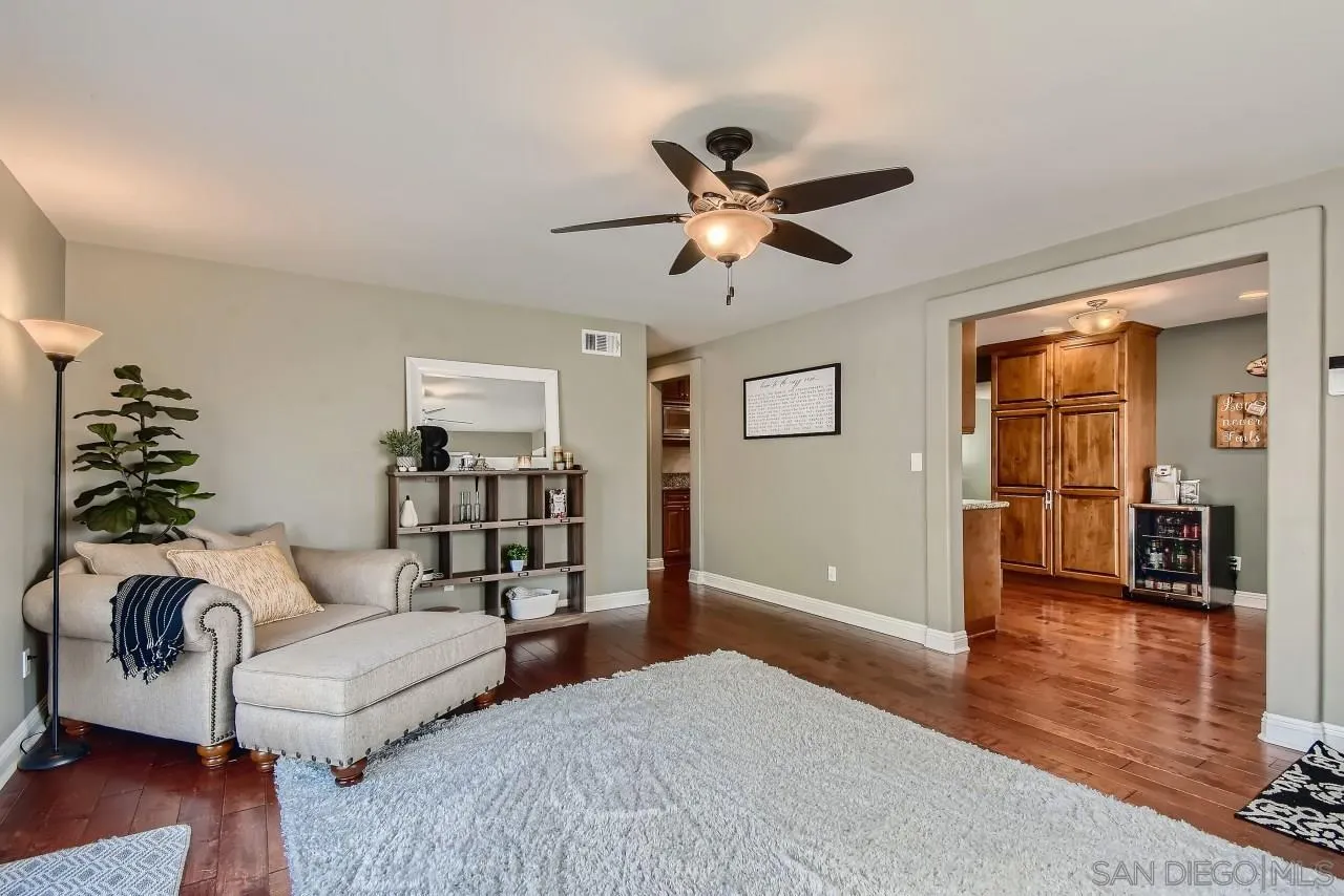 10023 Carreta Drive Santee, CA 92071 - Photo 5 of 24 a bedroom with furniture and wooden floor