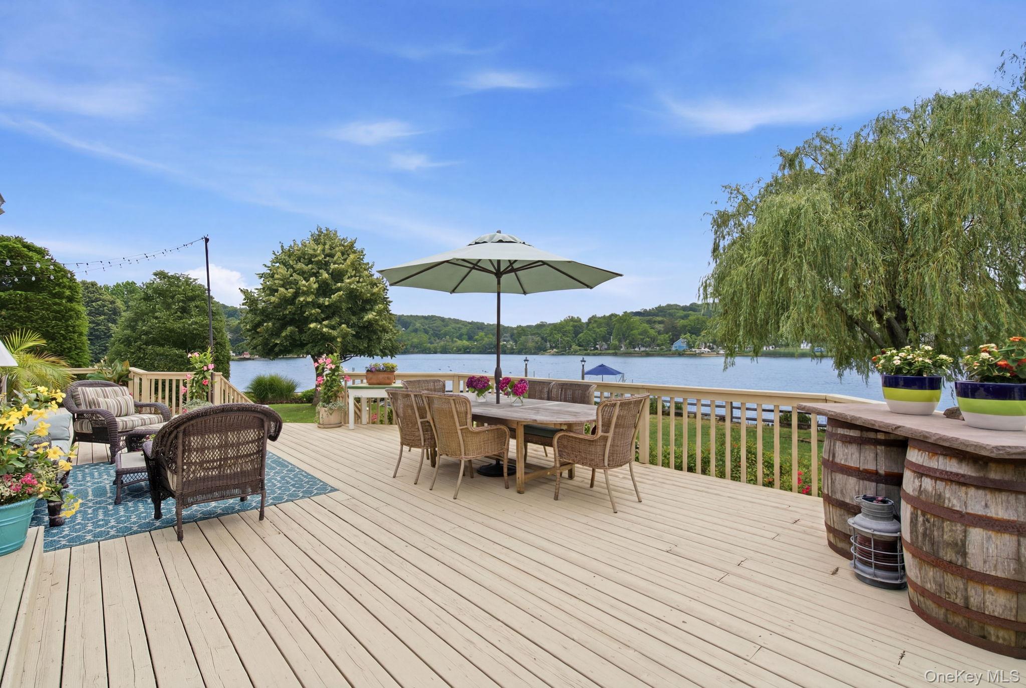 33 Prospect Road Centerport, NY 11721 - Photo 41 of 48 Enjoy Al Fresco dining with exceptional pond views.