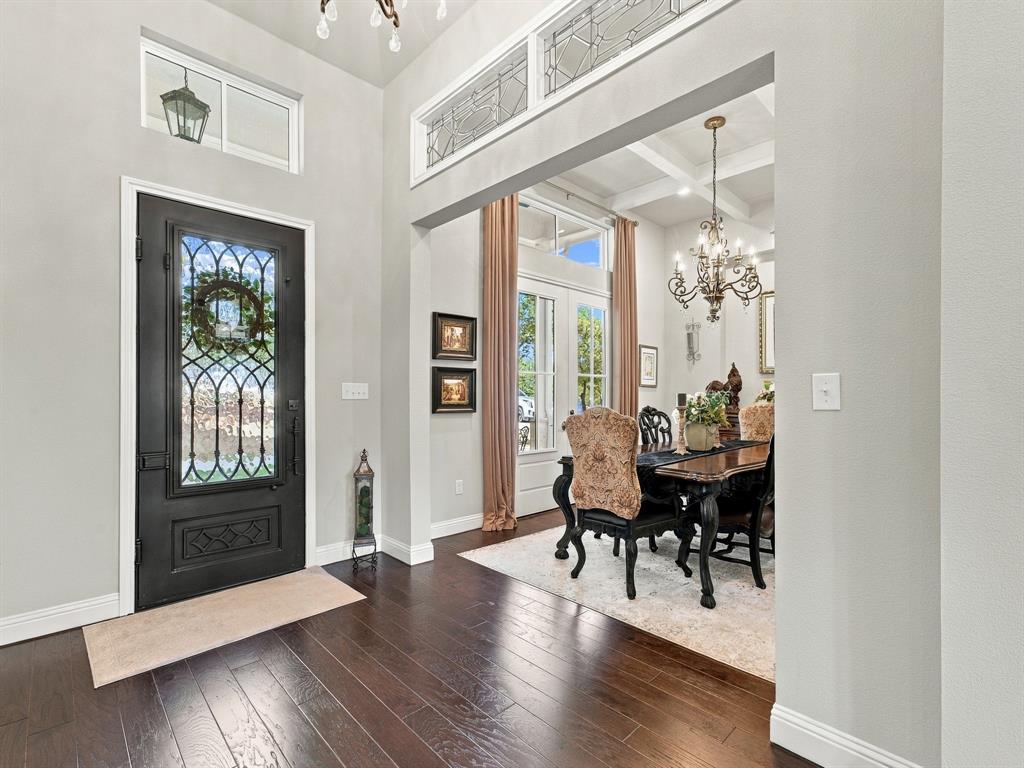 330 Rolling Bnd Road Alvord, TX 76225 - Photo 5 of 36 Hardwood-finish flooring, a decorative glass entry door, and transoms with decorative glass above
