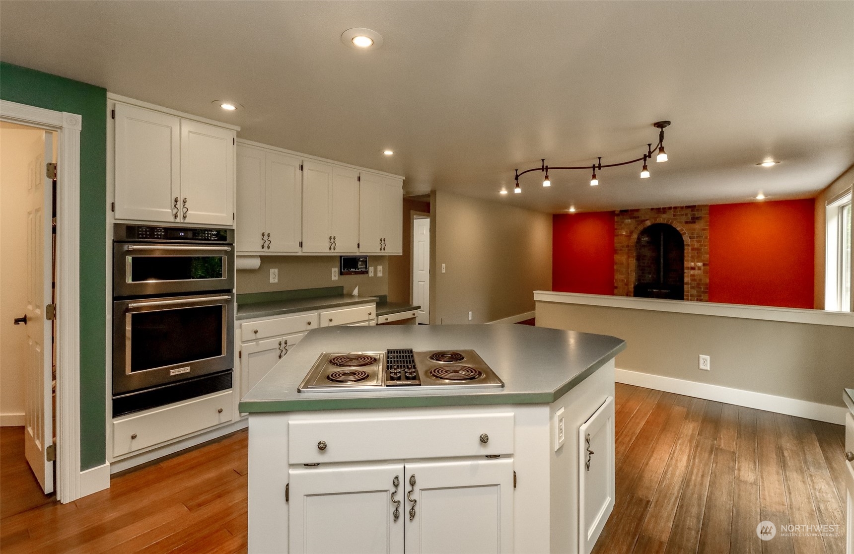 16918 Southeast 149th Street Renton, WA 98059 - Photo 12 of 40 a kitchen with a stove and a refrigerator