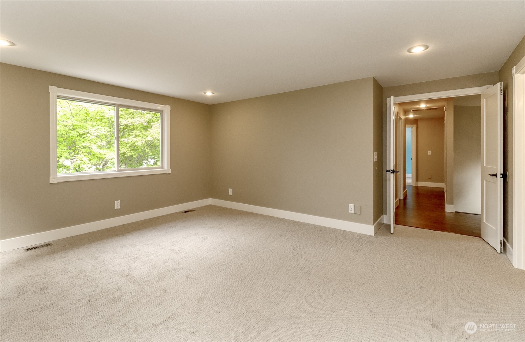 16918 Southeast 149th Street Renton, WA 98059 - Photo 26 of 40 an empty room with windows and closet