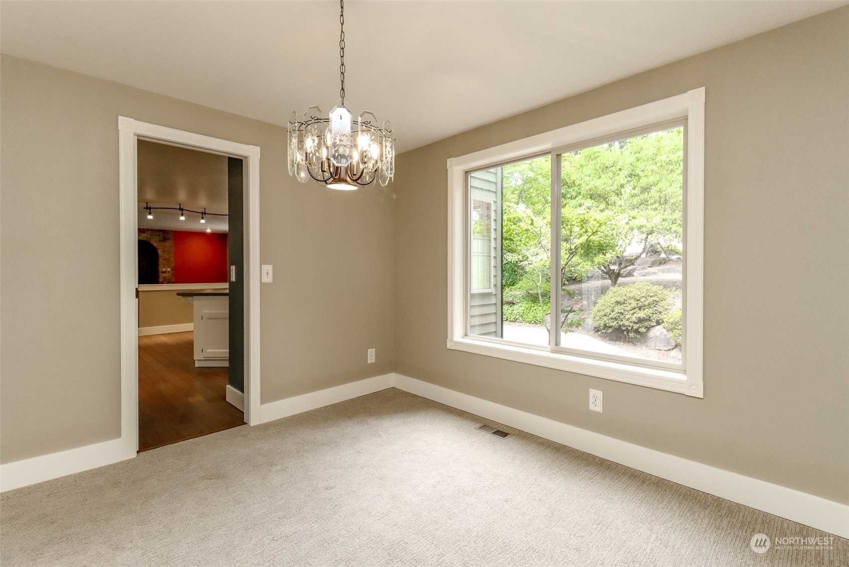 16918 Southeast 149th Street Renton, WA 98059 - Photo 8 of 40 a view of an empty room with a window