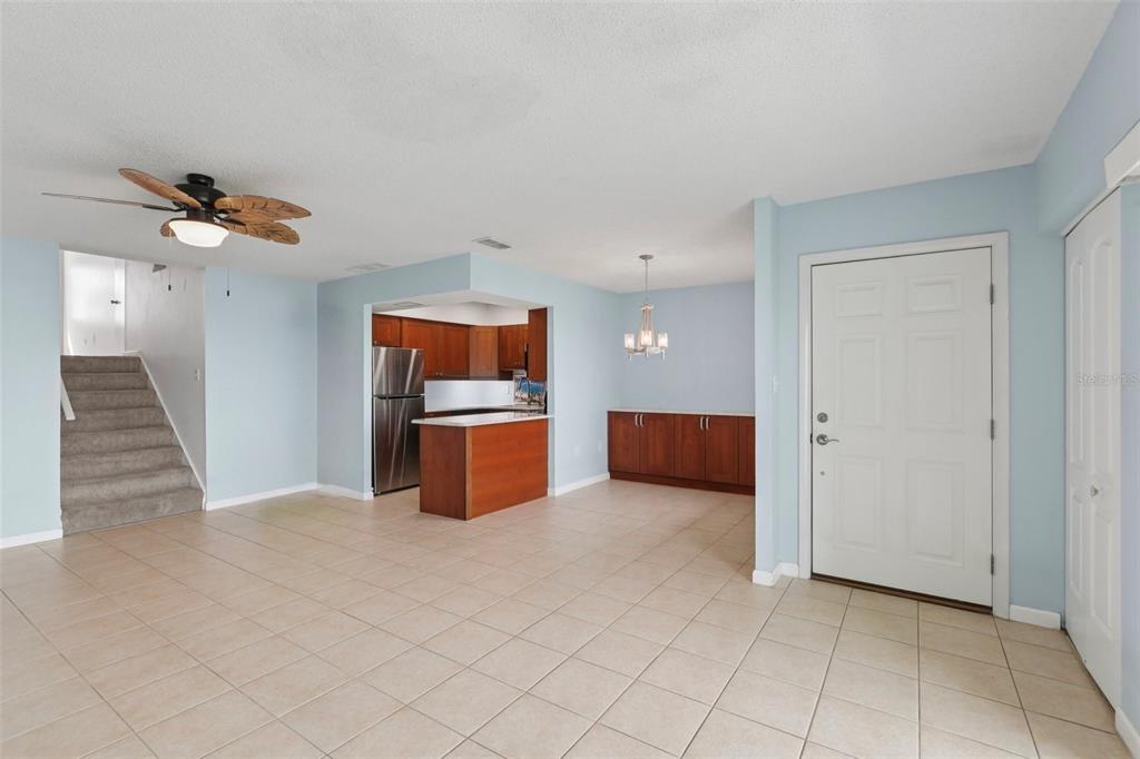 14800 Walsingham Road, Unit 1215 Largo, FL 33774 - Photo 13 of 34 a view of a kitchen with microwave and cabinets