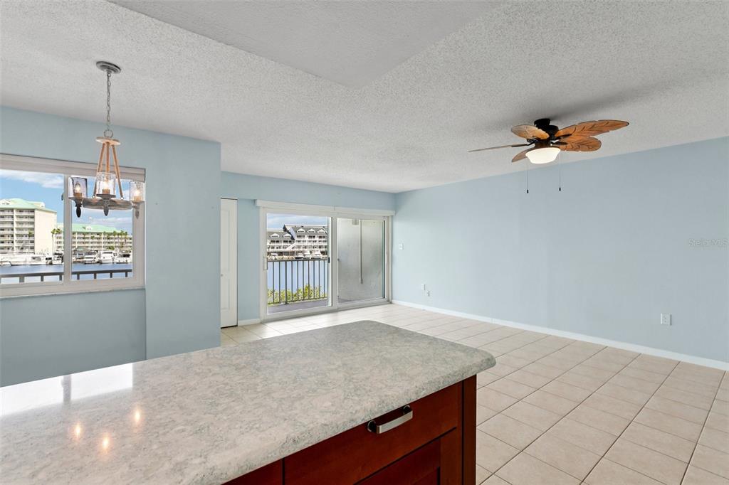 14800 Walsingham Road, Unit 1215 Largo, FL 33774 - Photo 3 of 34 a view of an empty room with a window