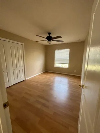 a view of empty room with windows