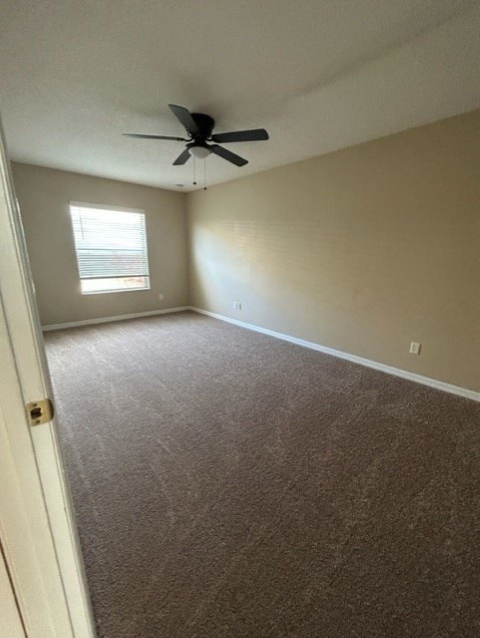 625 Nautical Way St. Augustine, FL 32080 - Photo 14 of 18 an empty room with windows and fan