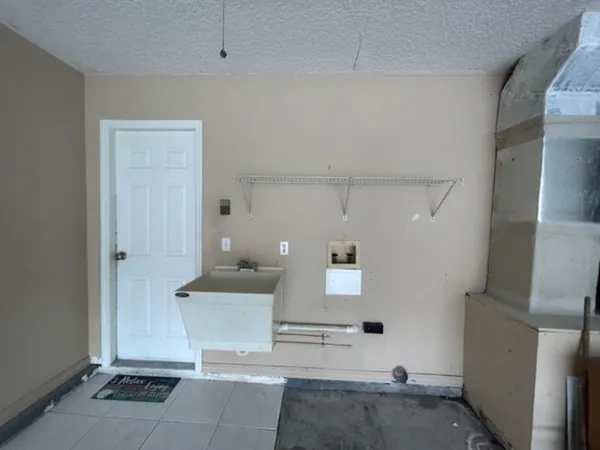 a room with a table and chairs