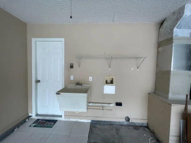 a room with a table and chairs