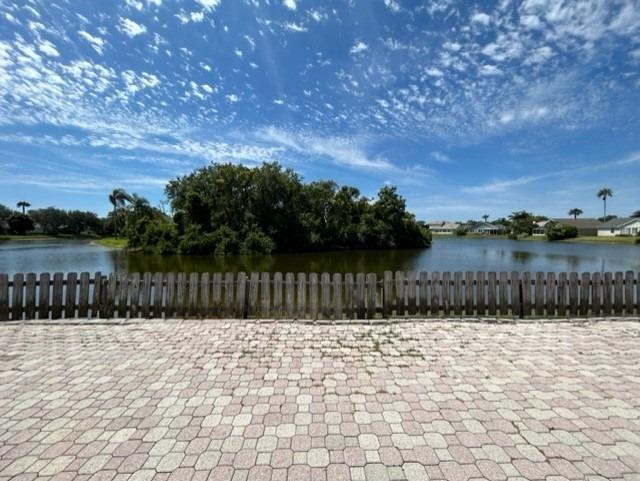 625 Nautical Way St. Augustine, FL 32080 - Photo 18 of 18 a view of swimming pool with a lake in the background