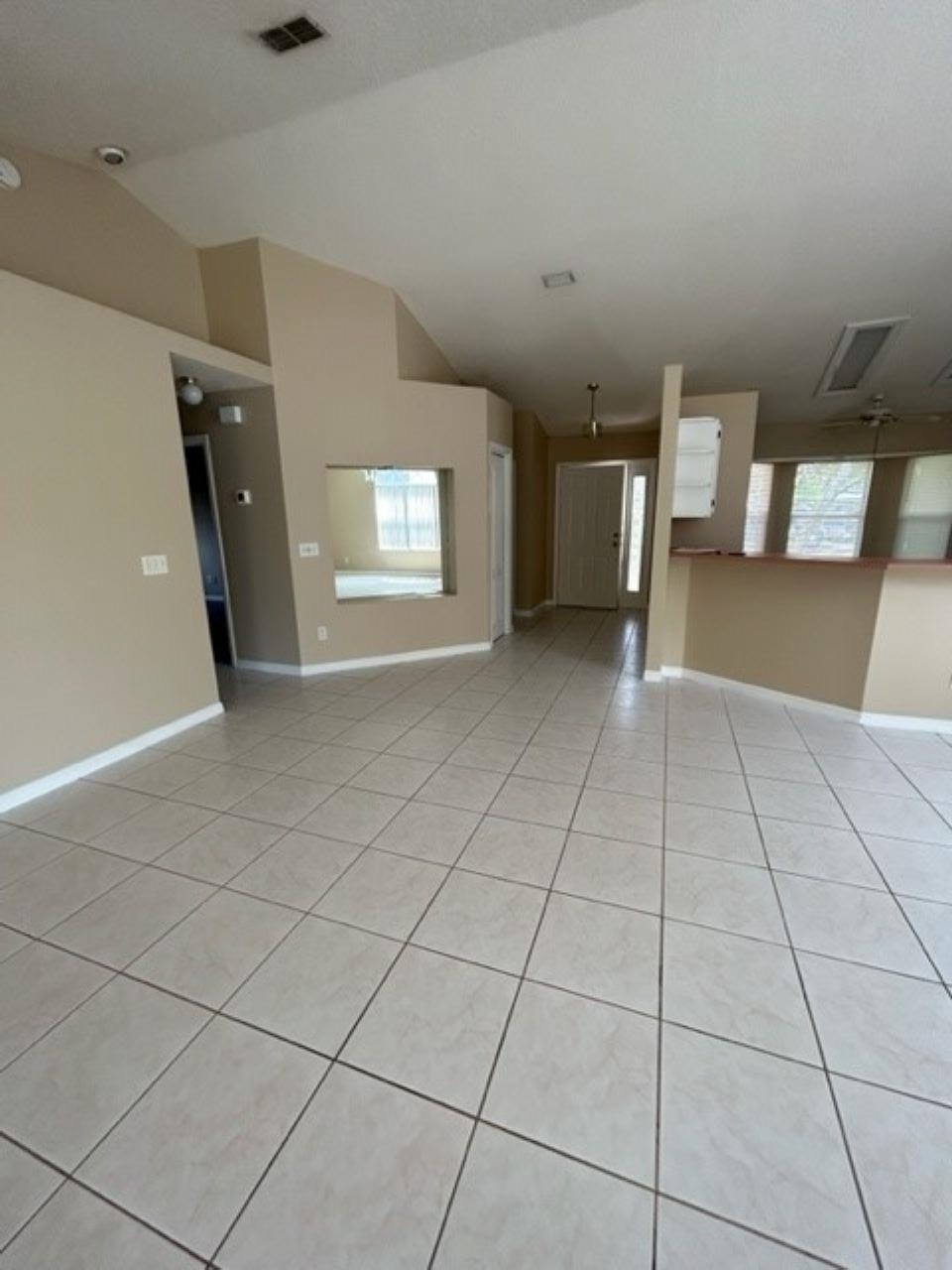 625 Nautical Way St. Augustine, FL 32080 - Photo 8 of 18 a view of an empty room and window