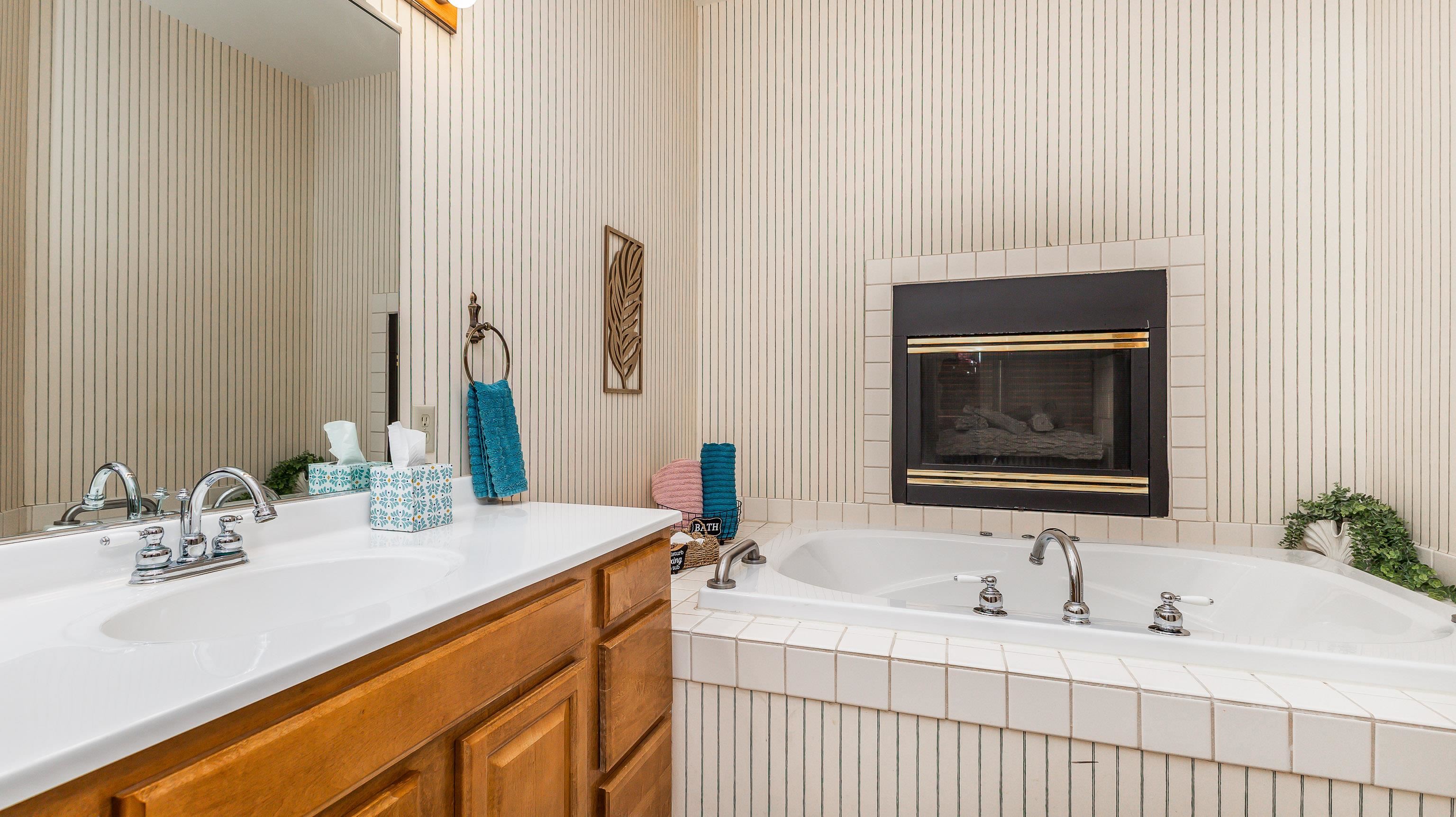5129 West Longhollow Road Galena, IL 61036 - Photo 9 of 20 a bathroom with 2 sink and a mirror