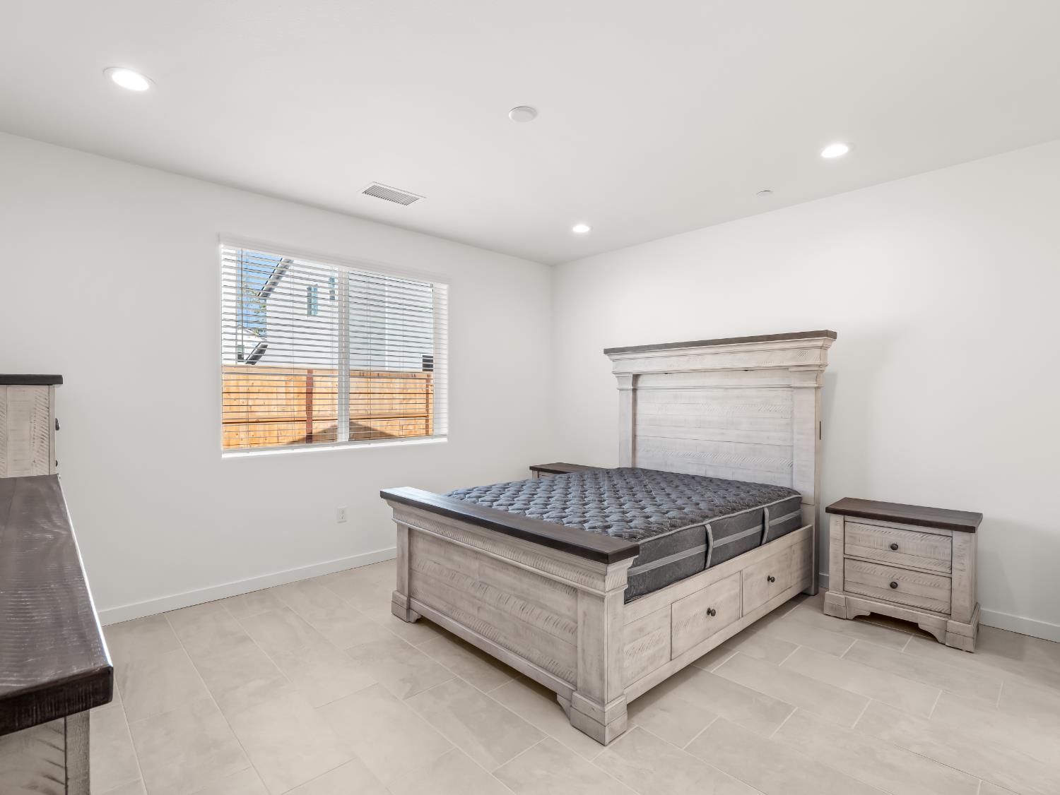 781 Elizabeth Avenue Madera, CA 93636 - Photo 13 of 31 a room with a bed and a window