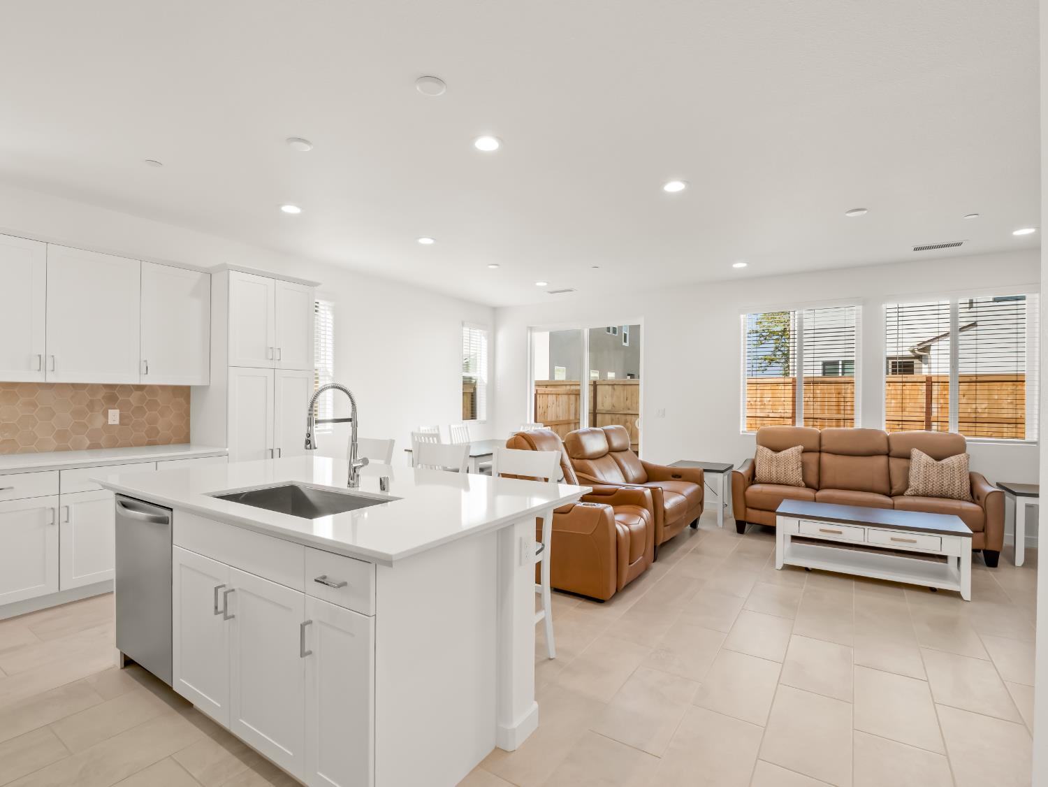 781 Elizabeth Avenue Madera, CA 93636 - Photo 7 of 31 a large white kitchen with stainless steel appliances
