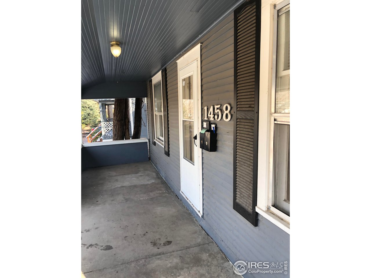 1458 10th Street Greeley, CO 80631 - Photo 13 of 21 a view of a hallway with windows