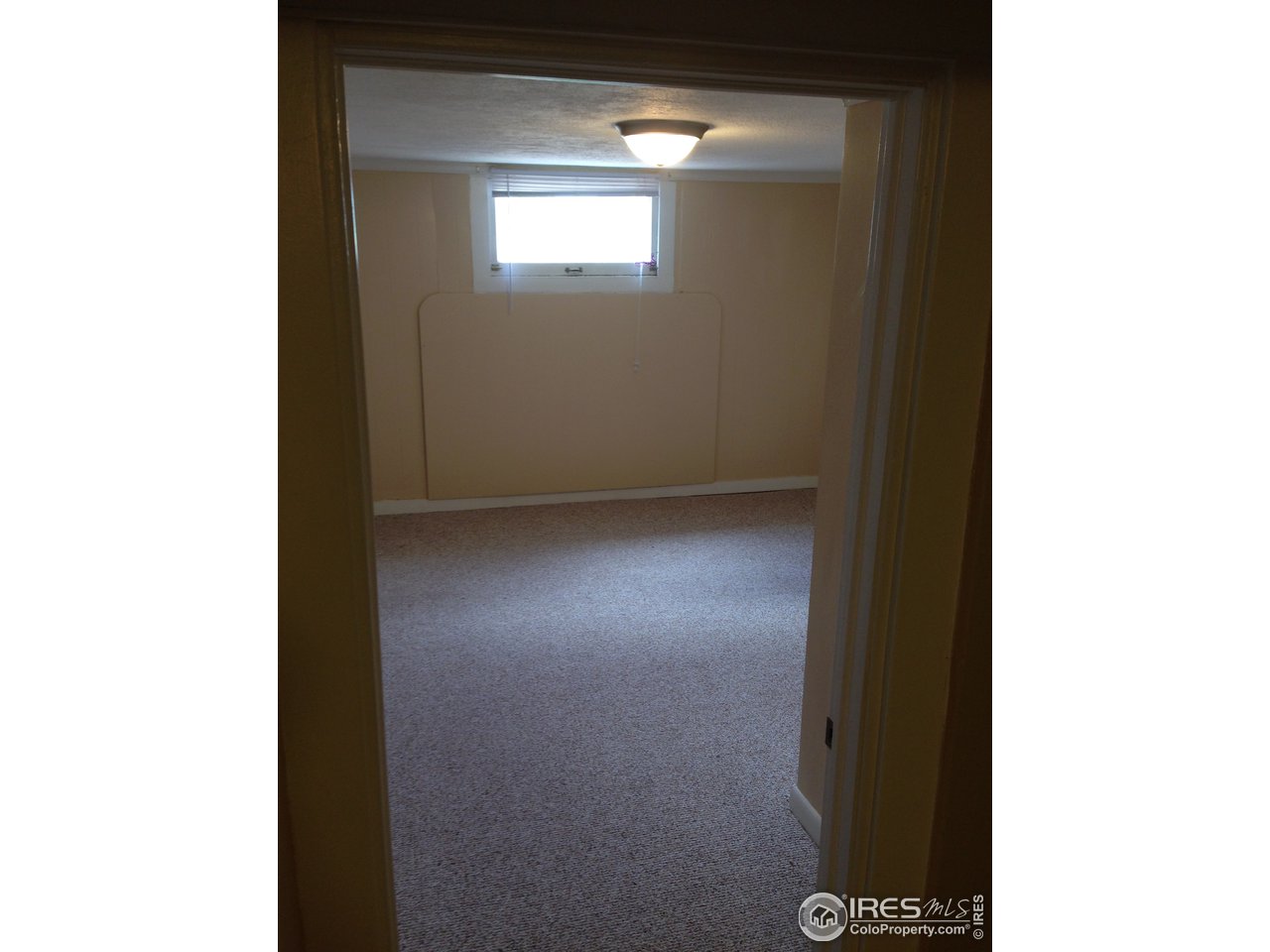 1458 10th Street Greeley, CO 80631 - Photo 14 of 21 a view of an empty room