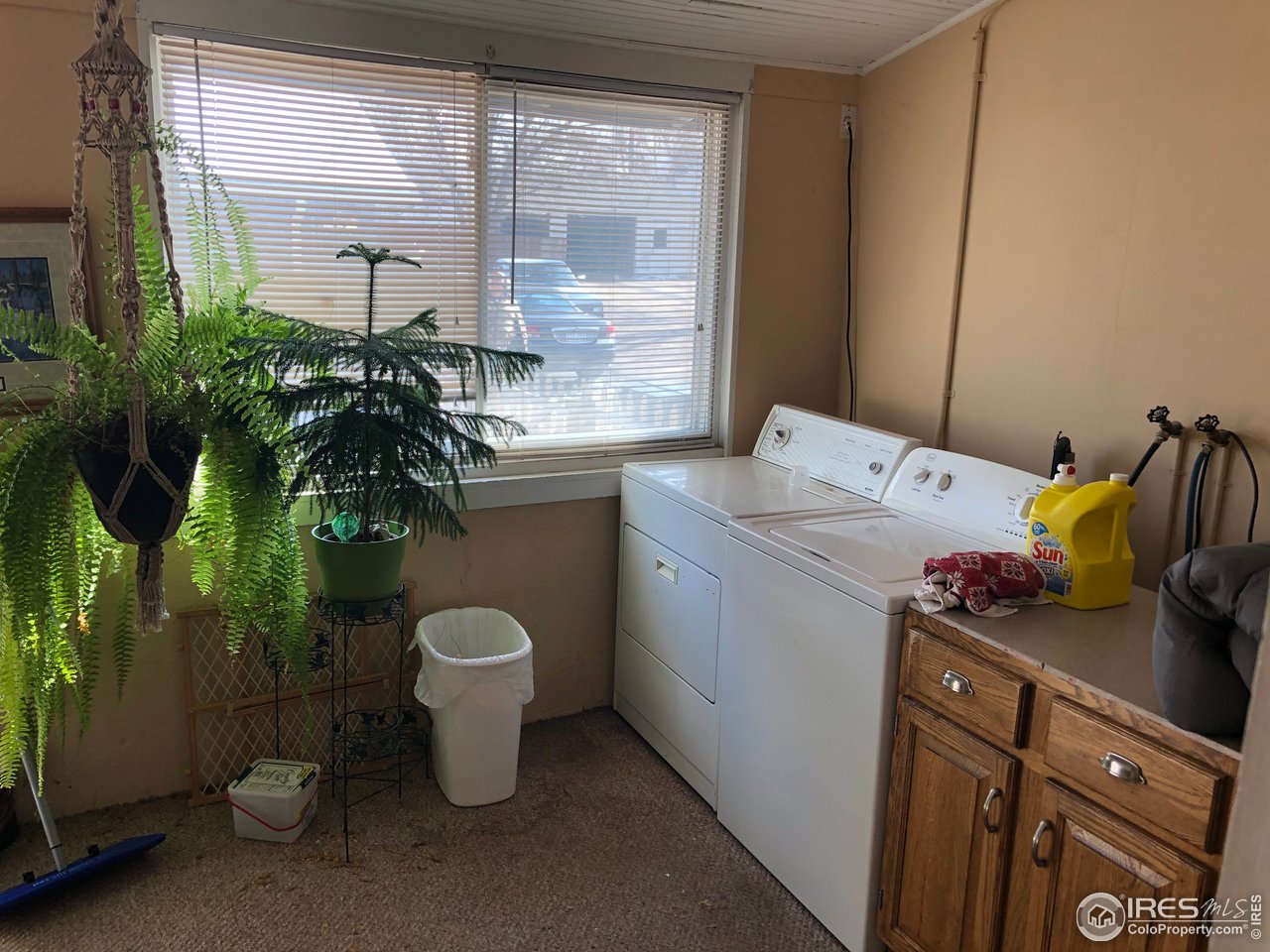 1458 10th Street Greeley, CO 80631 - Photo 6 of 21 a bathroom with a sink toilet and tub