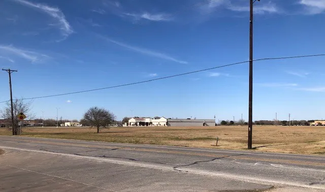 a view of a building with a ocean view