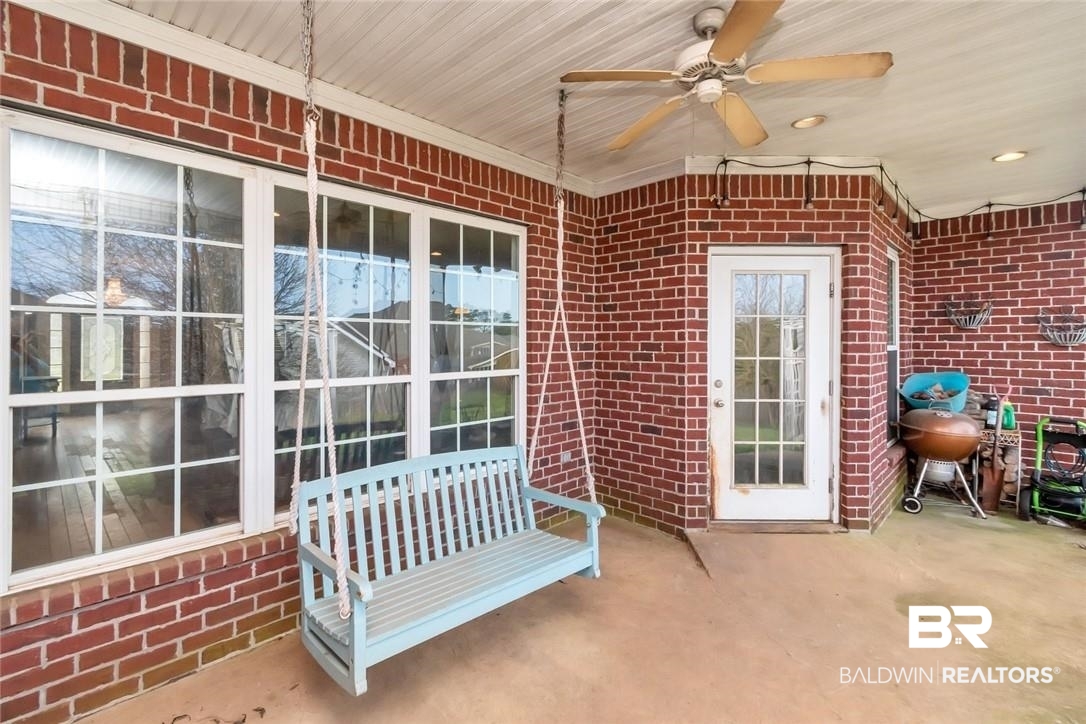 7170 Pierson Drive Mobile, AL 36619 - Photo 21 of 29 View of patio featuring ceiling fan