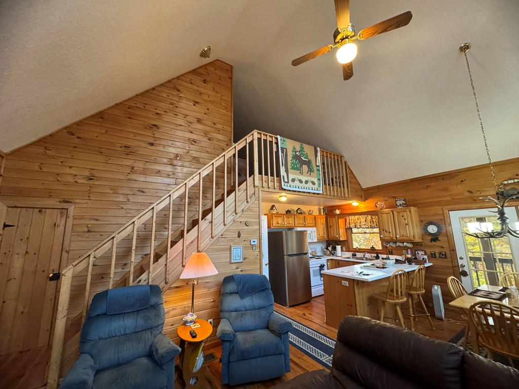664 Fox Run Drive Blue Ridge, GA 30513 - Photo 12 of 19 a view of a livingroom with furniture wooden floor and windows