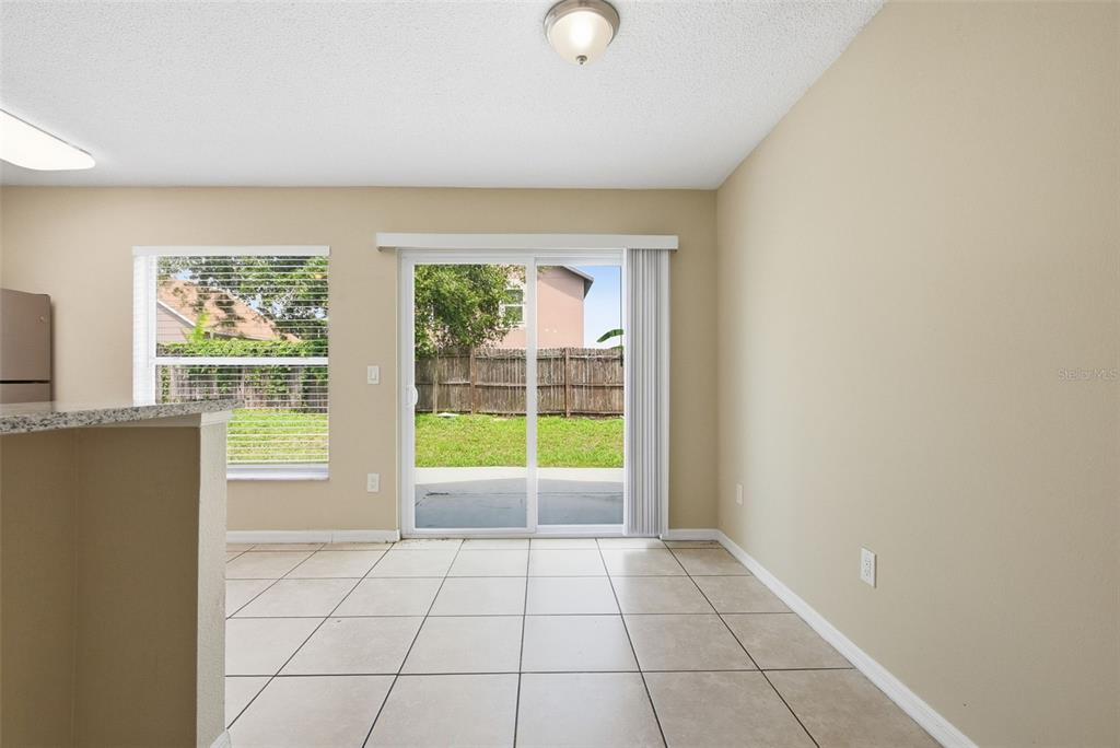 617 Greys Ferry Road Orlando, FL 32811 - Photo 12 of 35 a view of an empty room with a window