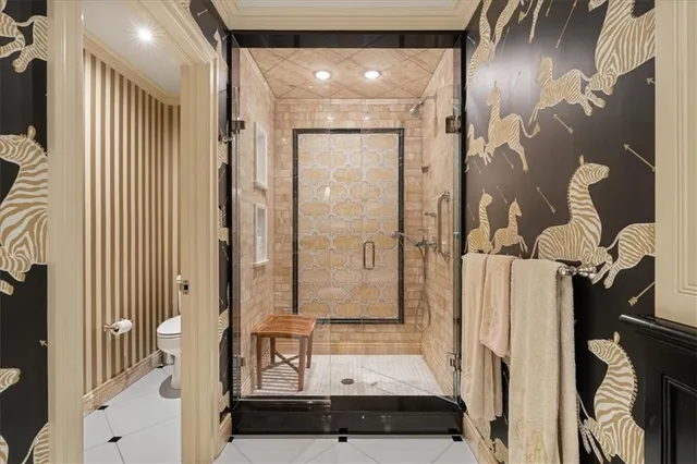 a bathroom with a tub and a shower