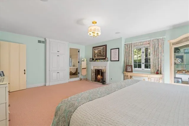 a view of a garden with a house