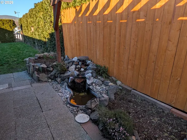 a view of a back yard of the house