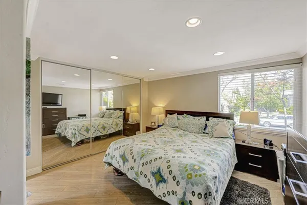 a bed room with a bed and a couch